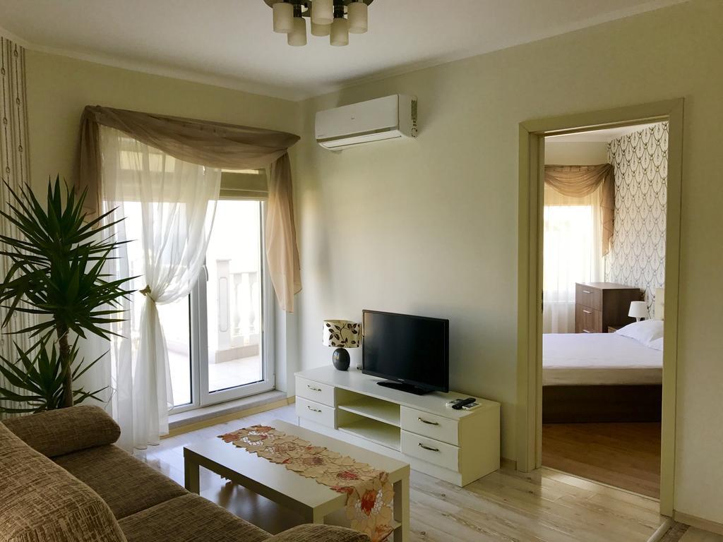 One-Bedroom Apartment with Balcony and Partial Sea View